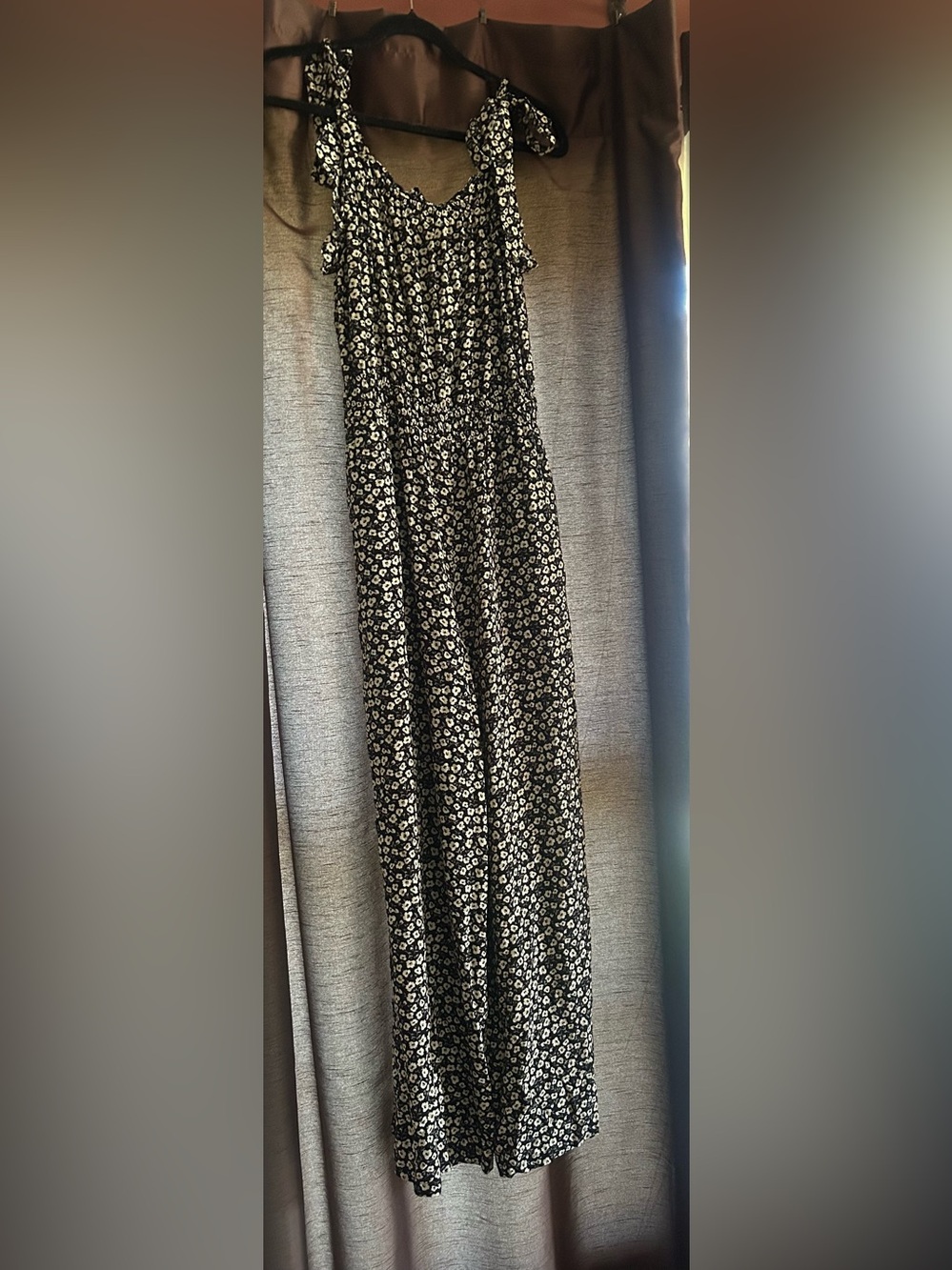 Francesca’s Black and White Floral Jumpsuit